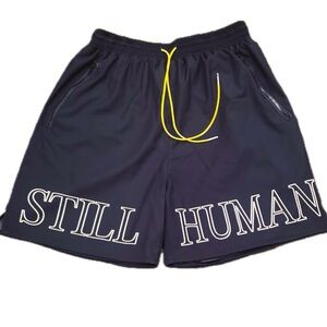 Black STILL HUMAN shorts